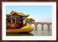 The Summer Palace, a traditional Dragon Boat passes the Seventeen Arch Bridge, Kunming lake, Beijing, China Fine Art Print
