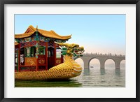 The Summer Palace, a traditional Dragon Boat passes the Seventeen Arch Bridge, Kunming lake, Beijing, China Fine Art Print