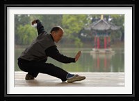 Man Doing Tai Chi Exercises at Black Dragon Pool with One-Cent Pavilion, Lijiang, Yunnan Province, China Framed Print