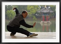 Man Doing Tai Chi Exercises at Black Dragon Pool with One-Cent Pavilion, Lijiang, Yunnan Province, China Framed Print