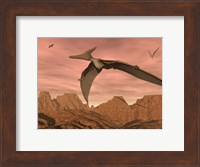 Three pteranodon dinosaurs flying above rocky landscape Fine Art Print