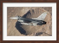 F-16C Fighting Falcon flying above Arizona's Meteor Crater Fine Art Print