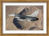 F-16C Fighting Falcon flying above Arizona's Meteor Crater Fine Art Print