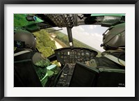 Two instructor pilots practice low flying operations in a UH-1H Huey helicopter Fine Art Print
