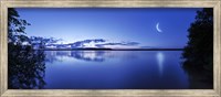 Moon rising over tranquil lake against moody sky, Mozhaisk, Russia Fine Art Print