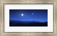 Mountain range on a misty night with moon and starry sky Fine Art Print