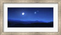 Mountain range on a misty night with moon and starry sky Fine Art Print