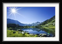 Muratov Lake against blue sky and bright sun in Pirin National Park, Bulgaria Fine Art Print