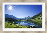 Muratov Lake against blue sky and bright sun in Pirin National Park, Bulgaria Fine Art Print