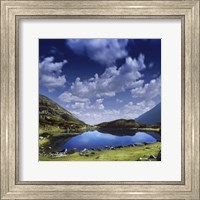 Blue lake in the Pirin Mountains over tranquil clouds, Pirin National Park, Bulgaria Fine Art Print