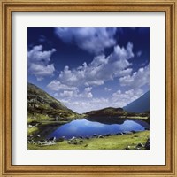Blue lake in the Pirin Mountains over tranquil clouds, Pirin National Park, Bulgaria Fine Art Print