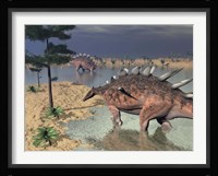 Kentrosaurus dinosaurs walking in the water next to sand and trees Framed Print