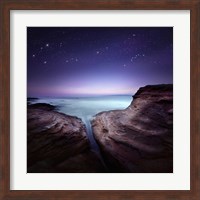 Two large rocks in a sea, against starry sky Fine Art Print