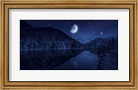 Moon rising over tranquil lake in the misty mountains against starry sky Fine Art Print