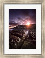 Rocky shore and tranquil sea against cloudy sky at sunset, Sardinia, Italy Fine Art Print