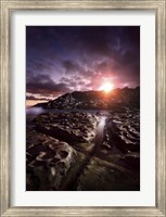 Rocky shore and tranquil sea against cloudy sky at sunset, Sardinia, Italy Fine Art Print