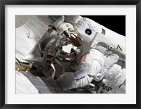 Maintenance on the International Space Station Fine Art Print