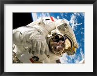 Astronaut taking a spacewalk Fine Art Print