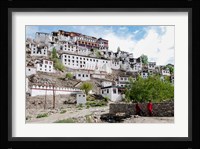 Monks standing in front of the Thiksey Monastery, Leh, Ledakh, India Fine Art Print