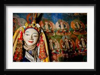 Religious statue infront of Buddha mural at Shey Palace, Ladakh, India Fine Art Print
