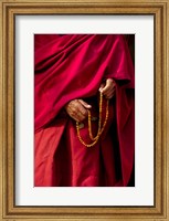 Hands of a monk in red holding prayer beads, Leh, Ladakh, India Fine Art Print