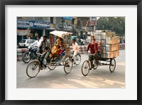 People and cargo move through streets via rickshaw, Varanasi, India Fine Art Print