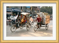 People and cargo move through streets via rickshaw, Varanasi, India Fine Art Print