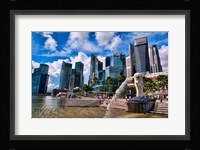 Merlion, symbol of Singapore, and downtown skyline in Fullerton area of Clarke Quay. Fine Art Print
