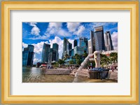 Merlion, symbol of Singapore, and downtown skyline in Fullerton area of Clarke Quay. Fine Art Print