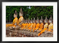 Row of Buddha statues, Wat Yai Chaya Mongkol or The Great Temple of Auspicious Victory, Ayutthaya, Thailand Fine Art Print
