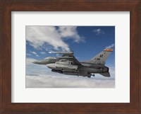 F-16 Fighting Falcon flies with AGM-65 Maverick Fine Art Print