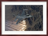 An F-16 Fighting Falcon Releases Flares Fine Art Print