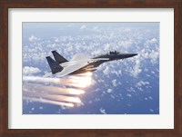 An F-15 Eagle Releases Flares over the Pacific Ocean Fine Art Print