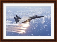 An F-15 Eagle Releases Flares over the Pacific Ocean Fine Art Print