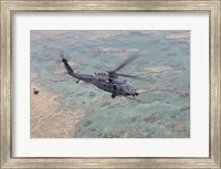 An HH-60G Pave Hawk Along the Coastline of Okinawa, Japan Fine Art Print