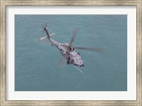 An HH-60G Pave Hawk Along the coastline of Okinawa, Japan (from above) Fine Art Print