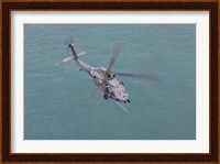 An HH-60G Pave Hawk Along the coastline of Okinawa, Japan (from above) Fine Art Print