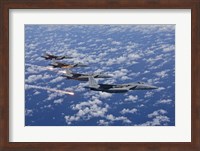 Four F-15 Eagles fly in Formation Over the Pacific Ocean Fine Art Print