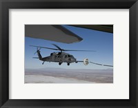 HH-60G Pave Hawk Conducts Aerial Refueling from an HC-130 Fine Art Print