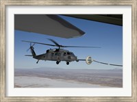 HH-60G Pave Hawk Conducts Aerial Refueling from an HC-130 Fine Art Print
