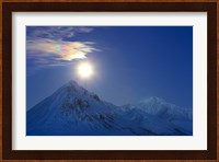 Full moon with Rainbow Clouds over Ogilvie Mountains, Canada Fine Art Print