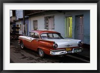 1950's era Ford Fairlane and colorful buildings, Trinidad, Cuba Fine Art Print