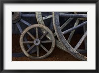Rustic wagon wheels on movie set, Cuba Fine Art Print