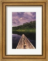 Paddling a dugout canoe on Lake Anangucocha, Yasuni National Park, Amazon basin, Ecuador Fine Art Print