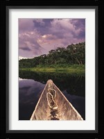 Paddling a dugout canoe on Lake Anangucocha, Yasuni National Park, Amazon basin, Ecuador Fine Art Print