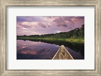 Paddling a dugout canoe, Amazon basin, Ecuador Fine Art Print