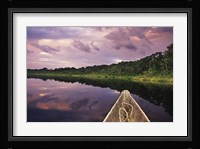 Paddling a dugout canoe, Amazon basin, Ecuador Fine Art Print