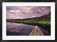 Paddling a dugout canoe, Amazon basin, Ecuador Fine Art Print