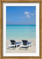 Sand and beach chairs await tourists, Varadero, Cuba Fine Art Print