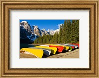 Moraine Lake and rental canoes stacked, Banff National Park, Alberta, Canada Fine Art Print